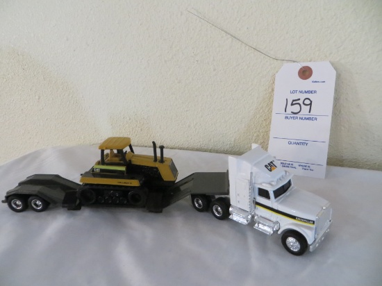 CATInternational semi and CAT Challenger 65 on hauler