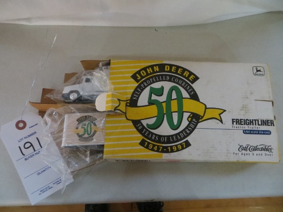 FreighlinerSemi and trailer John Deere Self Propelled Combine 50 year anniv