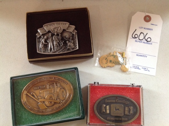3 John Deere Belt Buckles and a John Deere Pfab