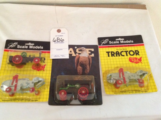 2 Scale Models sets one with steam engine and corn thrasher and a case stea