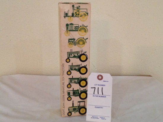 Eight John Deere Mini Toy Tractors Set