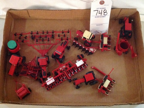 15 International toys, tractors, a plow, mixer mill and more