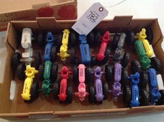 Flat of plastic Scale Models annual toy show tractors