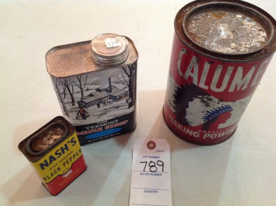 Can of Calumet baking powder, maple syrup can, and Nash's black pepper