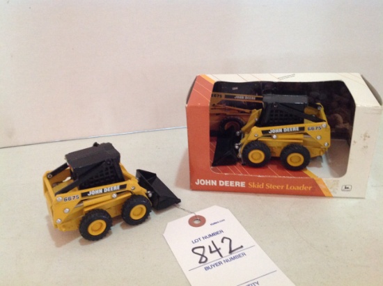 2 John Deere 6675 Skid Steer Loader
