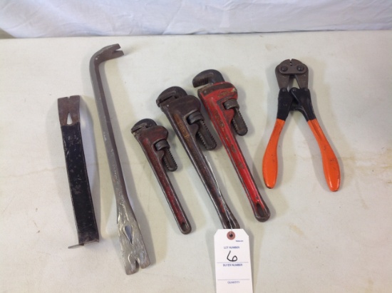 3 pipe wrenches, wire cutter, nail pullers