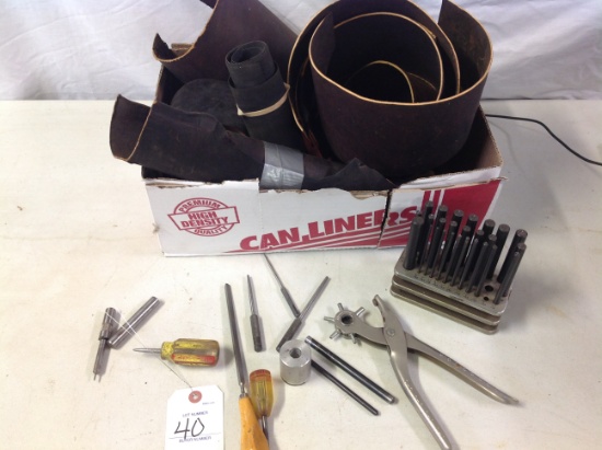 leather punch and leather pieces