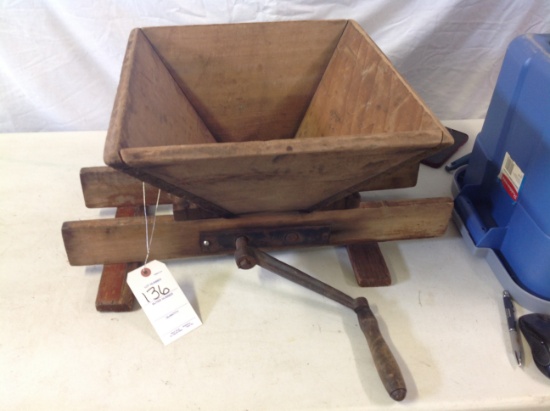 antique grape crusher by The Red Cross