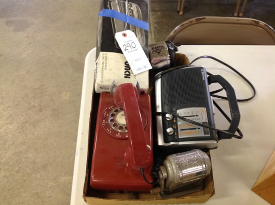 paper punch, rotary phone, 2 pencil sharpeners,  electric radio