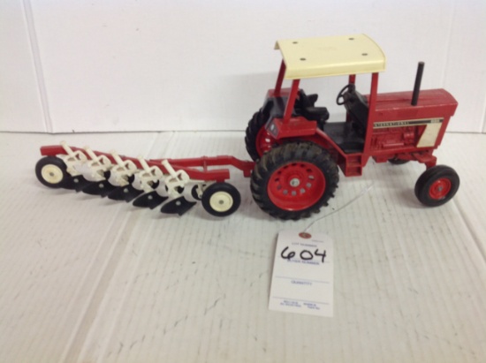 International 886 with International 5 bottom plow