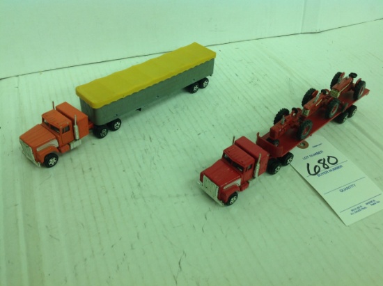 2 Semis one with International Tractors and one with a grain trailer