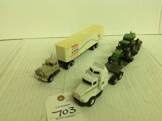 2 Semis, one hauling John Deere Tractors and one Ertl semi
