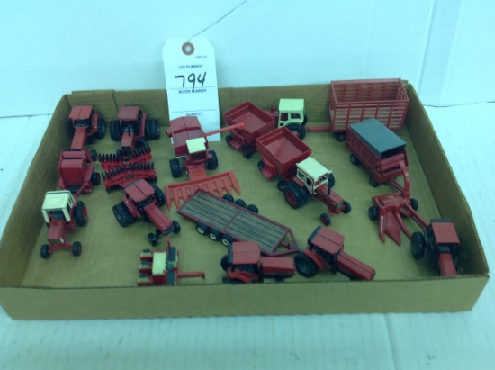 Various 1/64th scale International tractors