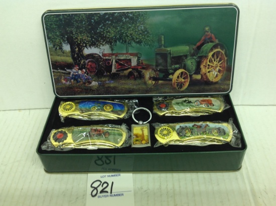 4 Pocket Knives some Farmall and some John Deere