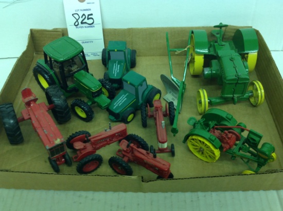 Assortment of various scales of John Deere and International tractors