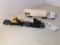 Mack Semi with Cat Trailer and Aeromax semi with trailer carrying a Cat Cha