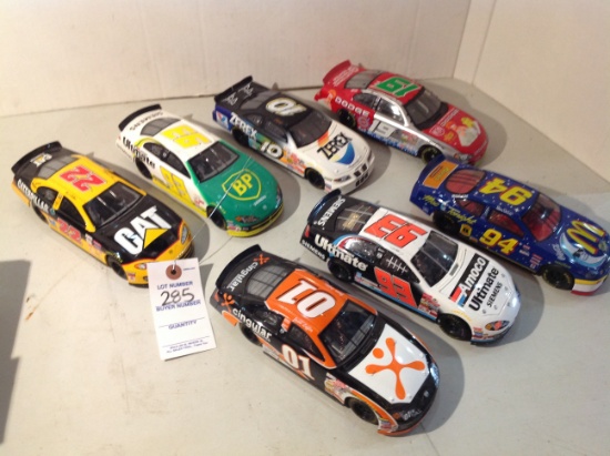 selection of race cars, Dodge, McDonald, Amoco, Cat, BP, Zerex and X