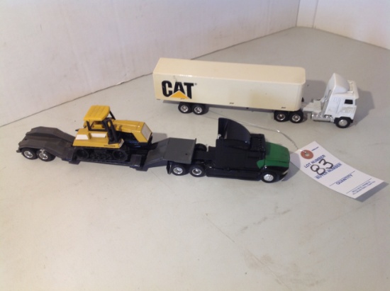 Mack Semi with Cat Trailer and Aeromax semi with trailer carrying a Cat Cha