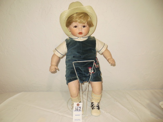 Sitting Boy Doll with ducks on clothes
