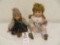 2 Sitting mini dolls
