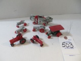Farmall 7 pieces, 5 tractors, steam engine, and corn sheller