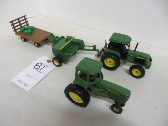 2 John Deere tractors, baler, flat bed wagon w/a few bales