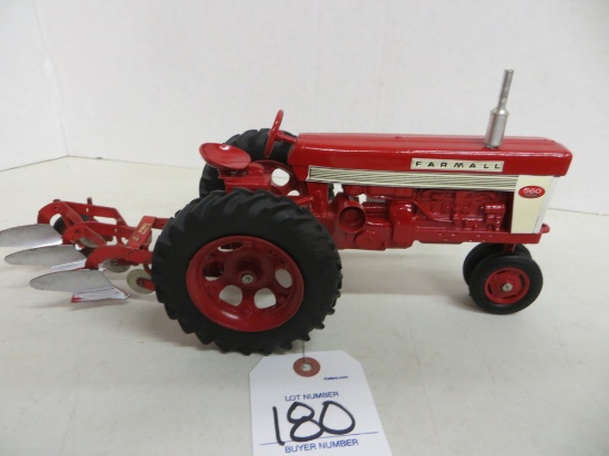 Farmall 560 & fast hitch 3 bottom plow