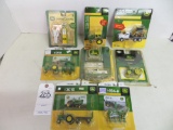 8 pc's of Assortment of John Deere trucks, tractors, fuel pump and more