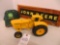 John Deere 5010 industrial tractor w/JD hat and wood framed plaque