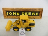 John Deere loader and homemade JD sign