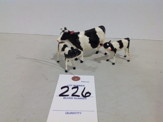 plastic cow & 2 calves