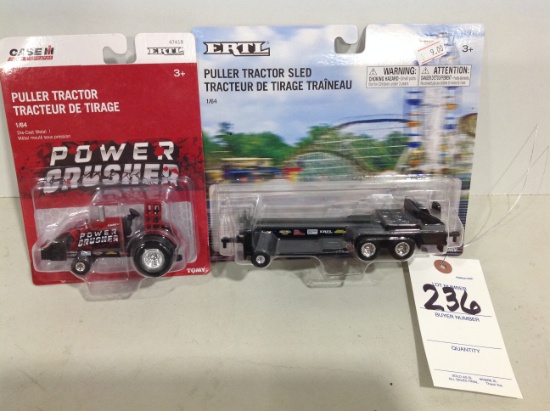 Power Brusher pulling tractor and pulling sled
