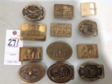 Collection of John Deere belt buckles, gold