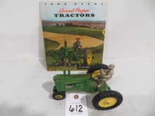 John Deere B tractor w/man, w/brochure featuring A, B and G w/two-cylinder tractor