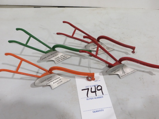 4 vintage pull type plows, commemorative items