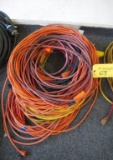 PILE OF EXTENSION CORDS