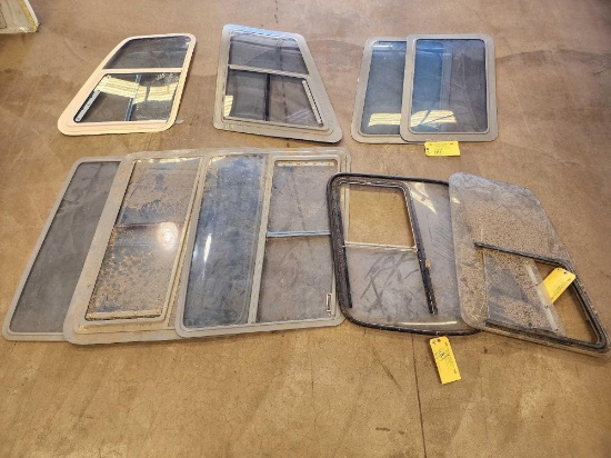 STACKS OF USED 206 WINDOWS (SOME HAVE CRACKS/DAMAGE)