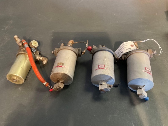 (4) 500 FILTER ASSYS 369H8021 & UNKNOWN P/N
