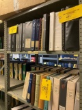 SHELVES OF MISC KING AIR MANUALS