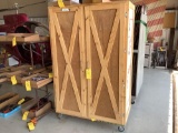 WOODEN CABINET ON CASTORS, 6 1/2' T X 4' W X 2' D (DOES NOT INCLUDE CONTENTS)