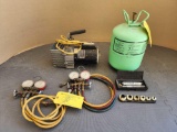VACUUM PUMP, AC RECHARGE MANIFOLD & PARTIAL CAN OF R22 REFRIGERANT