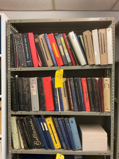 SHELVES OF BELLANCA MANUALS (DOES NOT INCLUDE THE SHELVING)