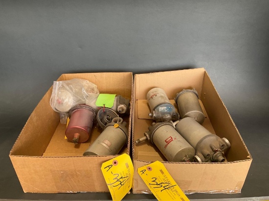 BOXES OF BELL FUEL FILTER HOUSINGS (VARIOUS CONDITIONS)