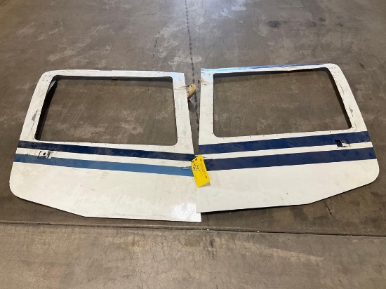PAIR OF DAMAGED CABIN DOORS