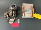 DISASSEMBLED SEARCH LIGHT, NEW WEAR SLEEVE 29800-8054, LANDING GEAR FILLET 369H6200-74 & CAP