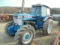 Ford 8210 Series 2, MFWD, Cab w/ Heat & AC, Dual Remotes, 6 Front Weights,
