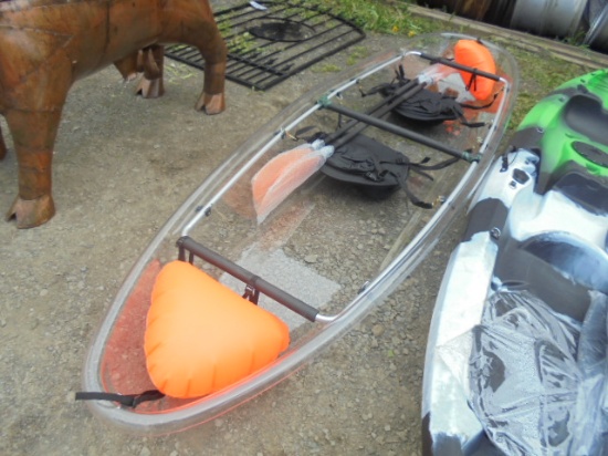 Clear Kayak With Paddles