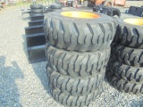 (4) New 12-16.5 SSL Tires & Rims On Case Yellow 8 Bolt Rims