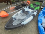 Green Kayak With Paddles