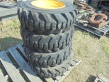(4) New 10-16.5 SSL Tires & Rims, New Holland Yellow